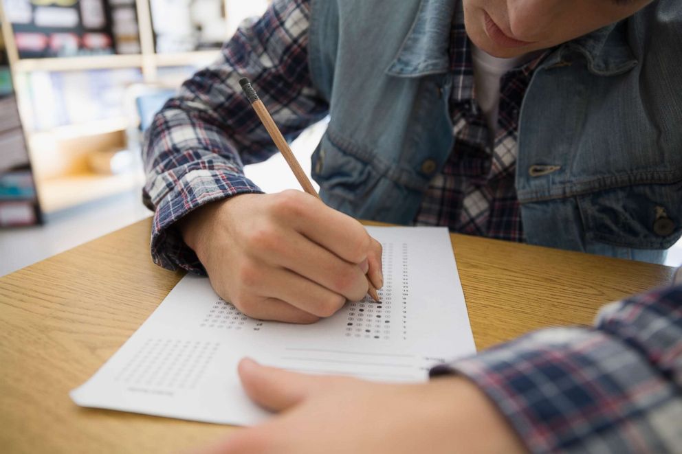 PHOTO: A high school student completes a multiple choice test form in this undated stock photo.