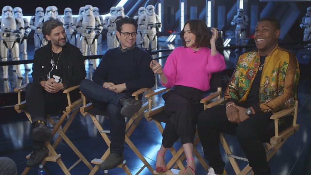 PHOTO: "Star Wars" co-stars Oscar Isaac, Daisy Ridley and John Boyega with director J.J. Abrams discuss the new film with ABC News' Chris Connelly.