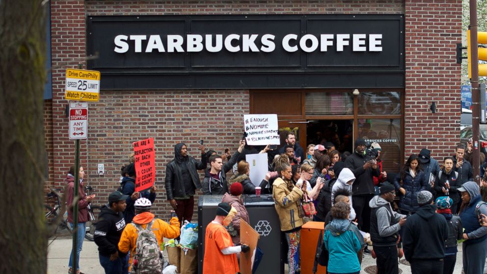 PHOTO: Protesters demonstrate outside a Center City Starbucks, April 15, 2018 in Philadelphia.