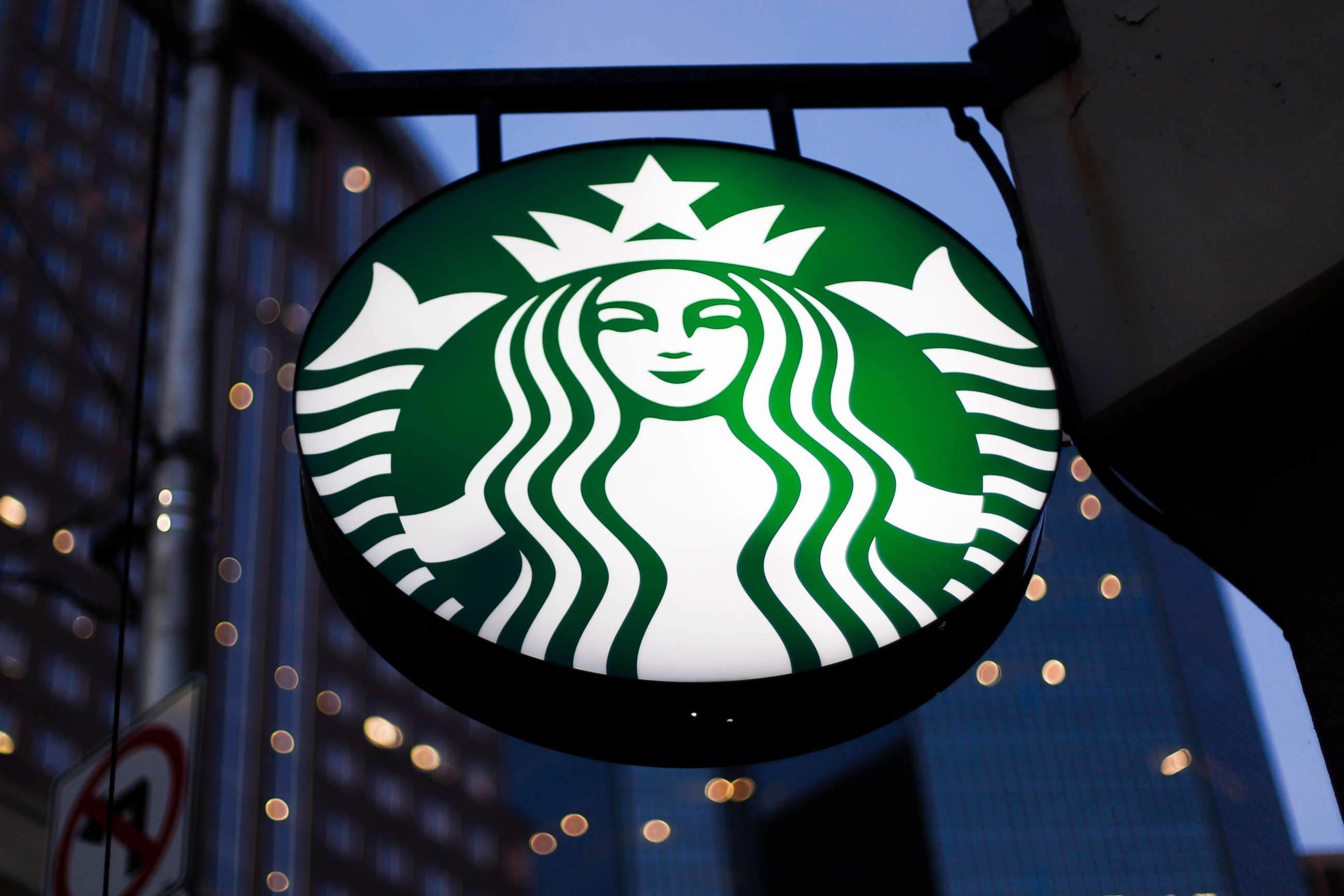 PHOTO: FILE - This June 26, 2019 file photo shows a the Starbucks sign outside a Starbucks coffee shop in downtown Pittsburgh.  