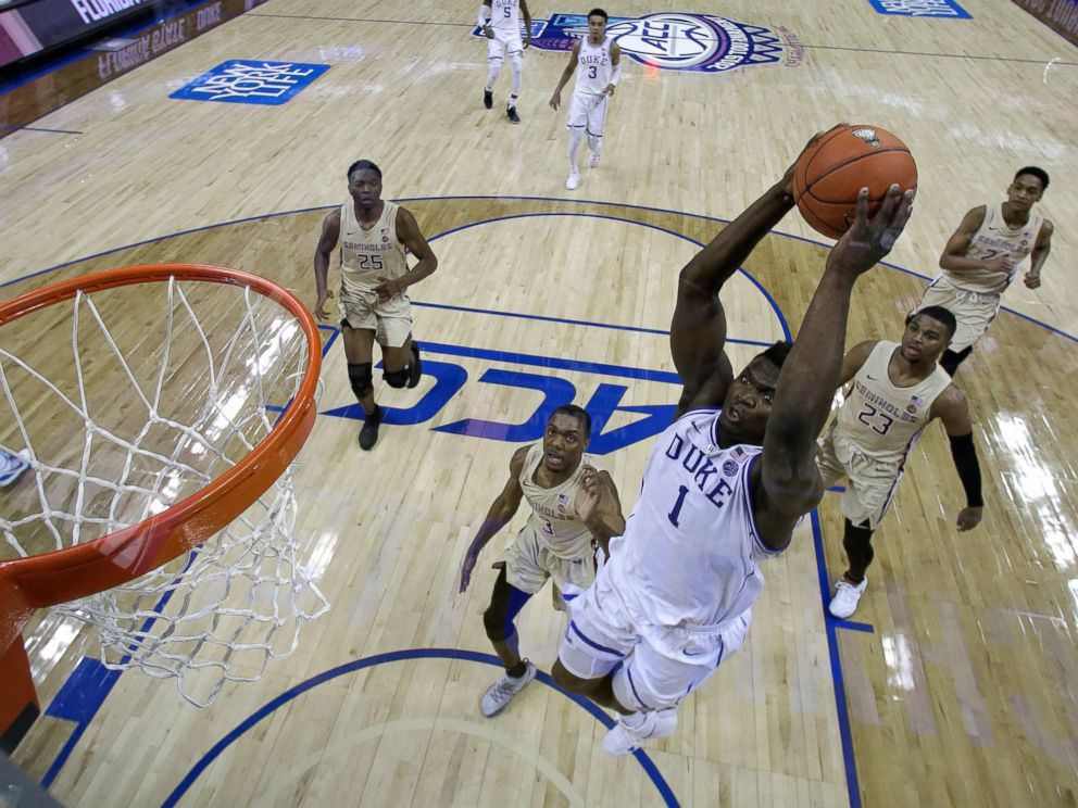 PHOTO: Duke's Zion Williamson goes up to dunk against Florida State during the first half of the NCAA college basketball championship game of the Atlantic Coast Conference tournament in Charlotte, N.C., Saturday, March 16, 2019.