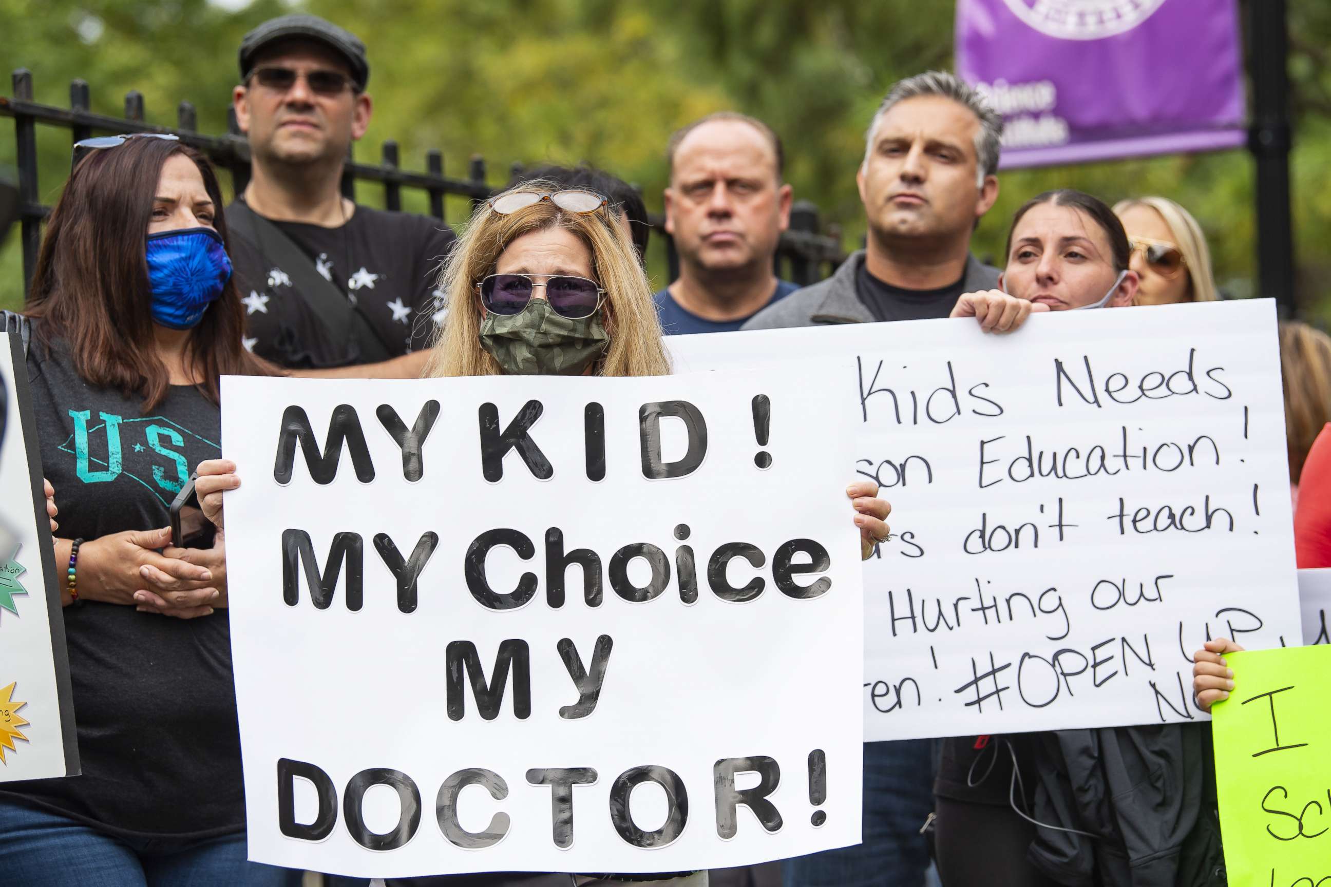 PHOTO: Parents and students gather to protest plans for the New York City public school system, including the required Covid testing by school doctors, in Staten Island, New York, Oct. 1, 2020.