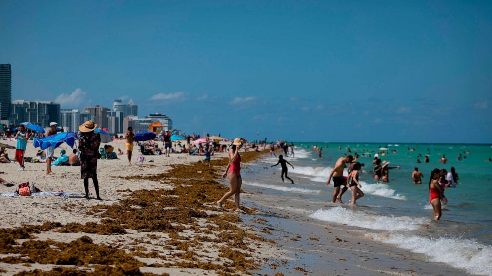 PHOTO: People gather on the beach in Miami, June 16, 2020.