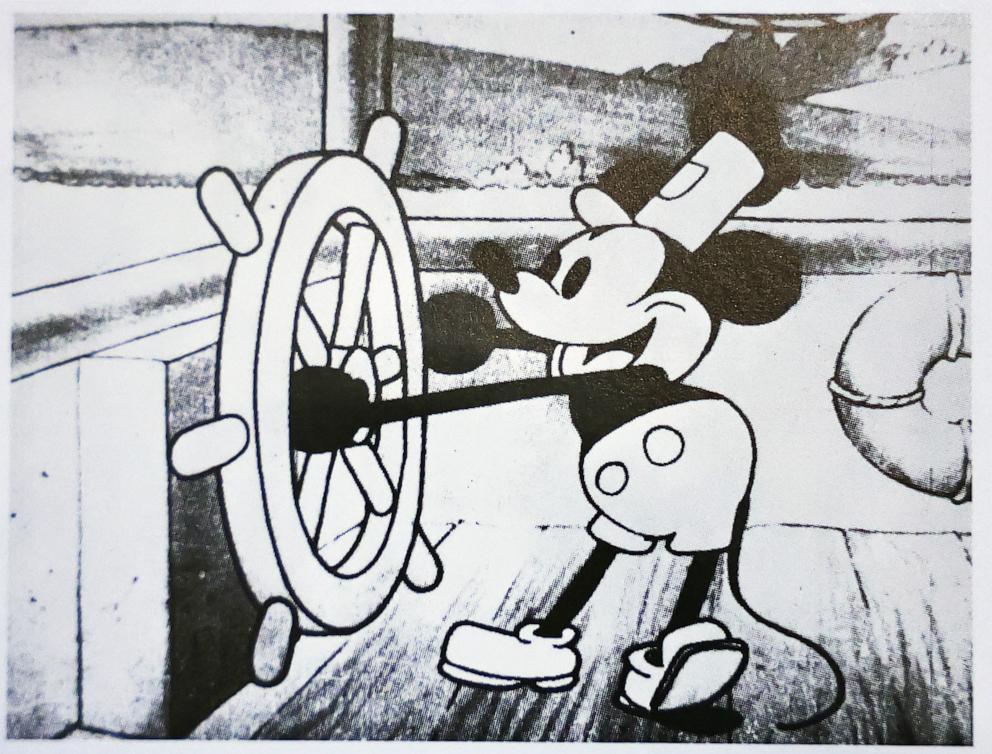 PHOTO: In this photo illustration, a still from Disney's 'Steamboat Willie' that was the debut of Mickey Mouse is seen in a book, Jan. 3, 2024, in Glendale, Calif.