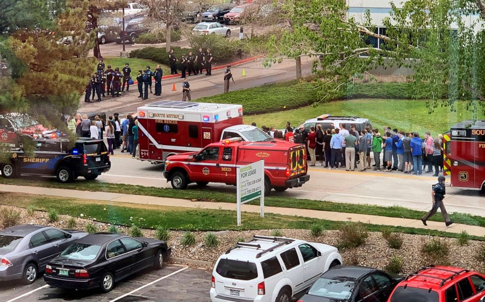 PHOTO: Police and students are seen outside STEM School Highlands Ranch, a charter middle school in the Denver suburb of Highlands Ranch, Colo., after a shooting, May 7, 2019.