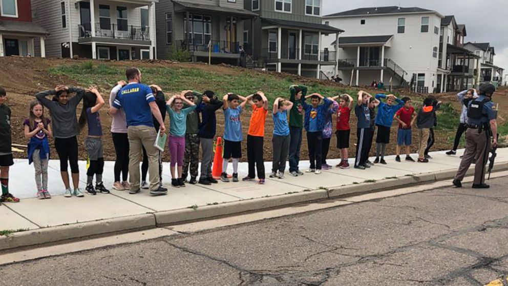 PHOTO: Children stand with their hands on their heads in a photo shared on social media after a shooting at STEM School Highlands Ranch in Highlands Ranch, Colo., May 7, 2019.