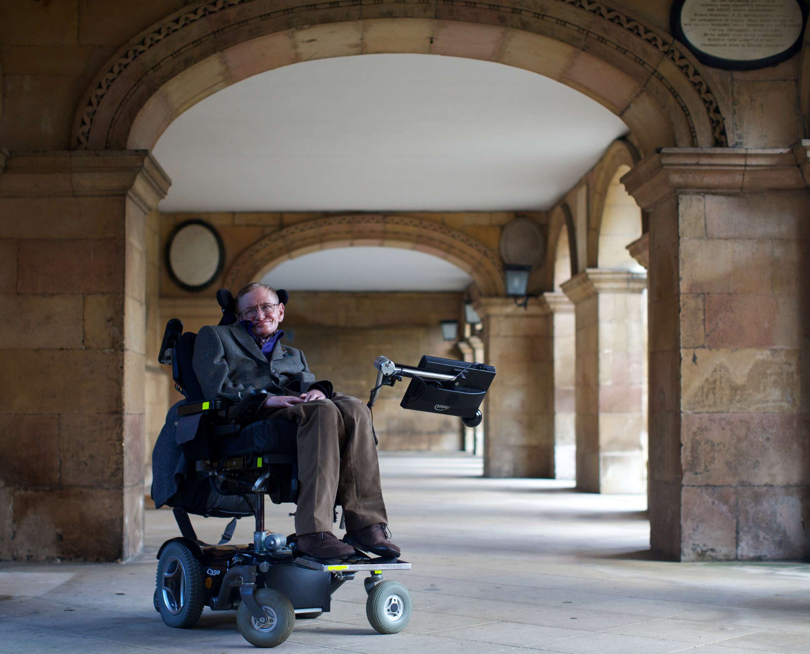 PHOTO: Theoretical physicist Stephen Hawking poses during a screening of the documentary 'Hawking', a film about the scientist's life, in Cambridge, Sept. 19, 2013. 