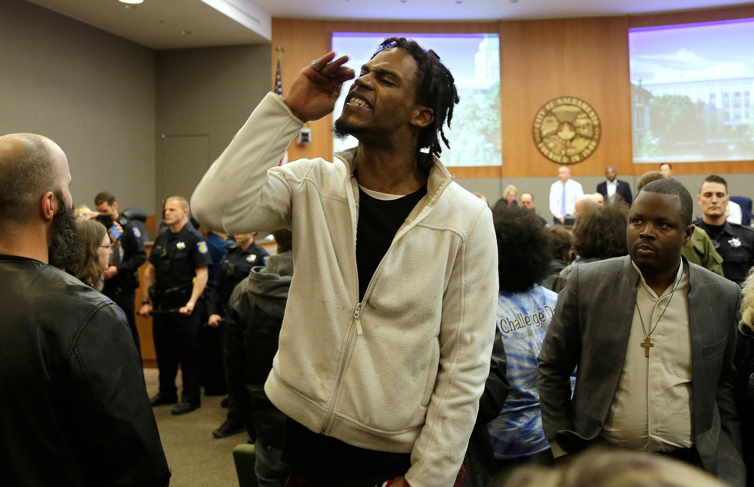 PHOTO: Protester Alexander Clark who is not related to Stephon Clark disrupts the Sacramento City Council during meeting Tuesday, March 5, 2019, in Sacramento, Calif.
