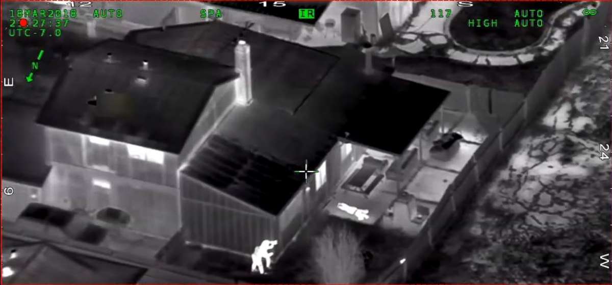 PHOTO: In this screen grab taken from police helicopter camera video released by the Sacramento Police Department, police are seen shooting at Stephon Clark in the backyard of his grandmothers house on March 18, 2018.