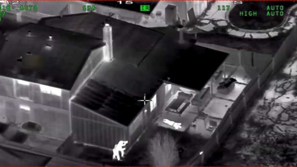 PHOTO: In this screen grab taken from police helicopter camera video released by the Sacramento Police Department, police are seen shooting at Stephon Clark in the backyard of his grandmothers house on March 18, 2018.
