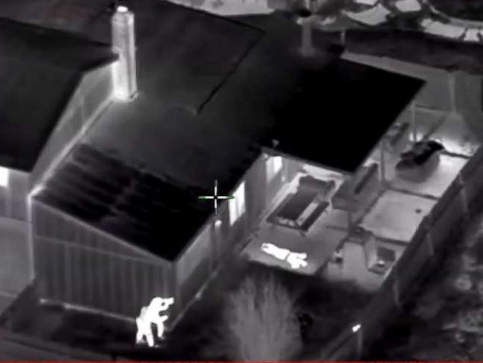 PHOTO: In this screen grab taken from police helicopter camera video released by the Sacramento Police Department, police are seen shooting at Stephon Clark in the backyard of his grandmothers house on March 18, 2018.