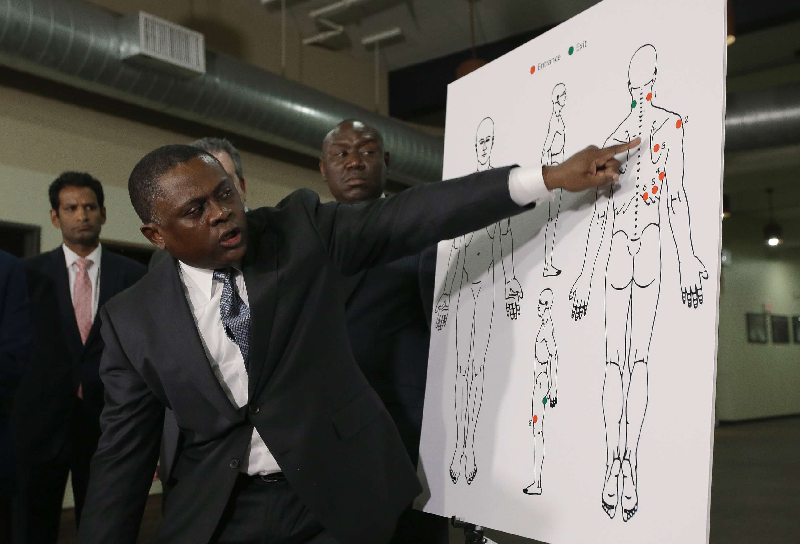 PHOTO: Pathologist, Dr. Bennet Omalu, gestures to a diagram showing the gun shot wounds he found on the body of police shooting victim Stephon Clark, during a news conference Friday, March 30, 2018, in Sacramento, Calif.