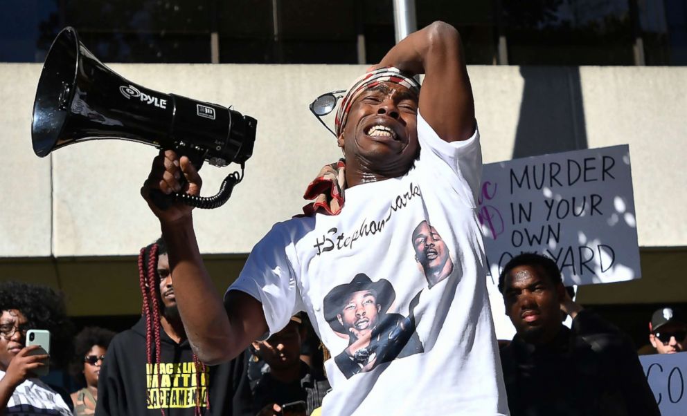 PHOTO: Stevante Clark, brother of Stephon Clark, addresses fellow protesters in response to the police shooting of his brother in Sacramento, Calif., on March 28, 2018.