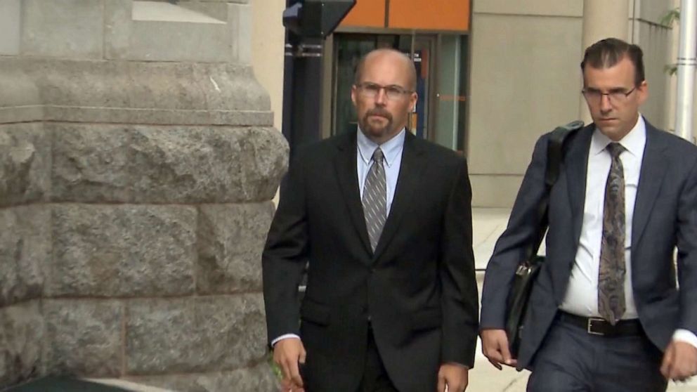 PHOTO: Former pharmacist Steven Brandenburg walks into federal courthouse in Milwaukee with an attorney for sentencing on June 8, 2021.
