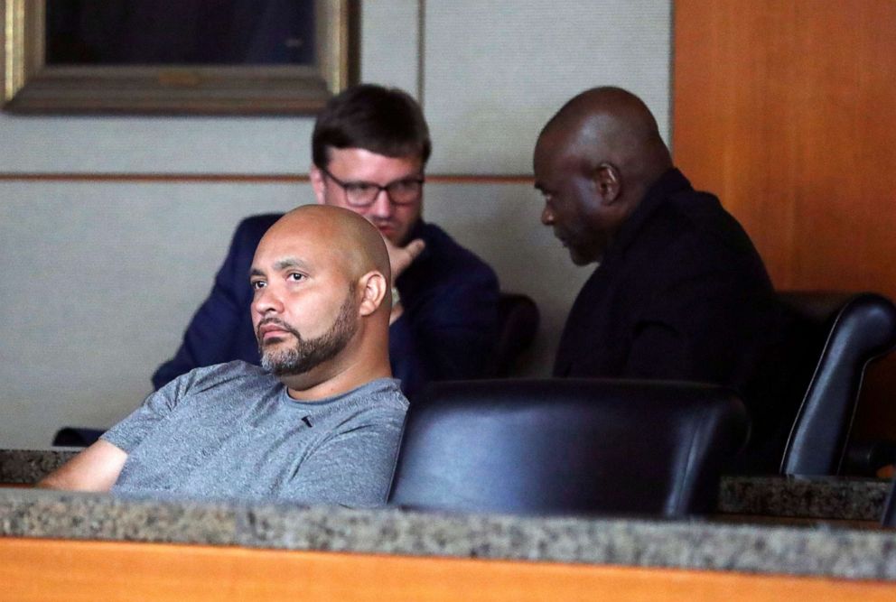 PHOTO: Former Houston police officers Steven Bryant, foreground, and Gerald Goines, background, turn themselves in at the Civil Courthouse, Friday, August 23, 2019, in Houston. 