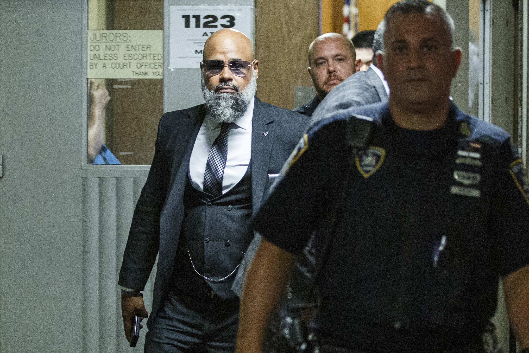 PHOTO: Steven Lopez, left, exits the courtroom following a hearing at the Supreme court, Monday July 25, 2022, in New York.