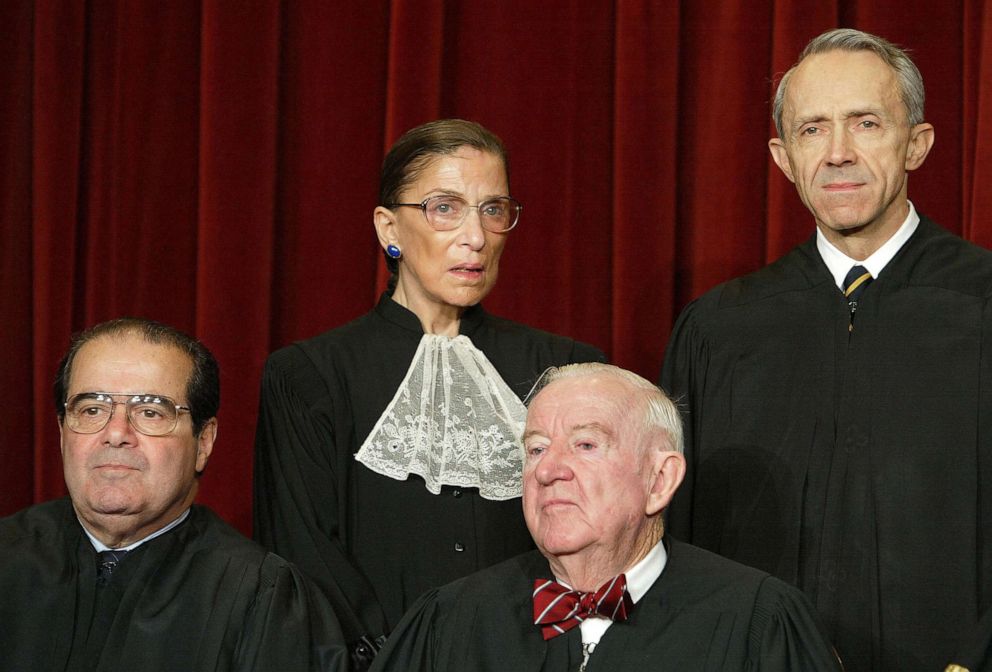 PHOTO: Supreme Court Justices (L-R, Seated) Associate Justice Antonin Scalia and Associate Justice John Paul Stevens, (L-R, Standing) Associate Justice Ruth Bader Ginsburg and Associate Justice David H. Souter at the Supreme Court, Dec. 5, 2003.