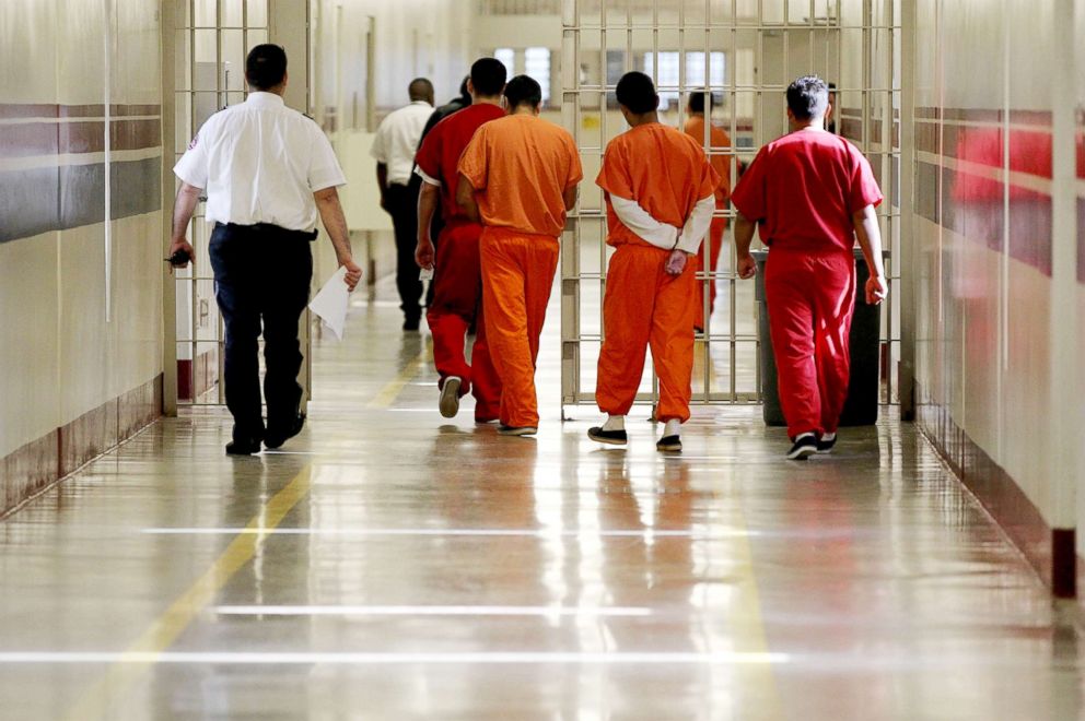 PHOTO: Detainees at the Stewart Detention Center in Lumpkin, Ga. are escorted through a corridor on May 03, 2012.