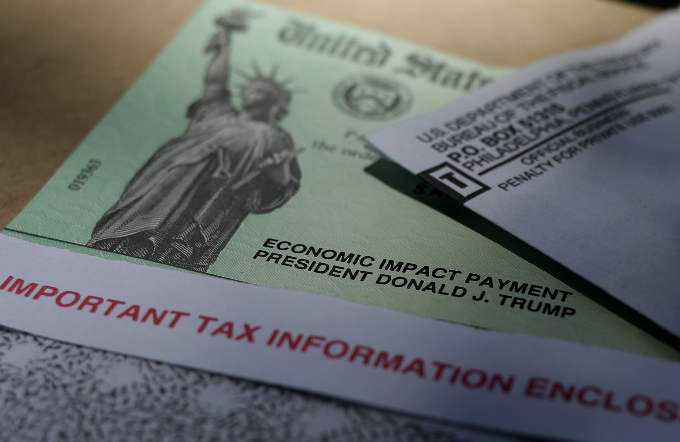 PHOTO: President Donald J.Trump's name is printed on a stimulus check issued by the IRS to help combat the adverse economic effects of the COVID-19 outbreak, April 23, 2020, in San Antonio.