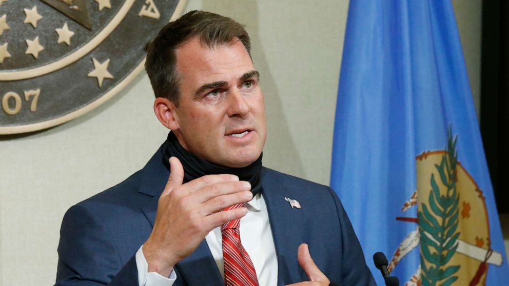 PHOTO: Oklahoma Gov. Kevin Stitt gestures as he speaks during a news conference, June 30, 2020, in Oklahoma City.