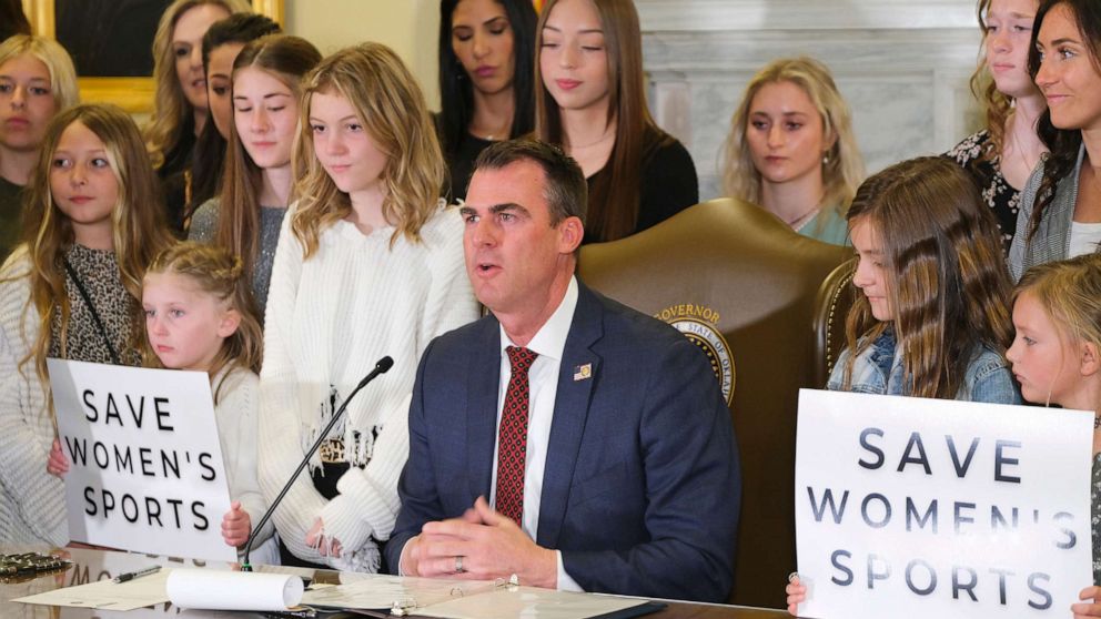 PHOTO: Governor Kevin Stitt signs SB2, the Save Women in Sports Act, in the Blue Room at the Capitol, March 30, 2022.
