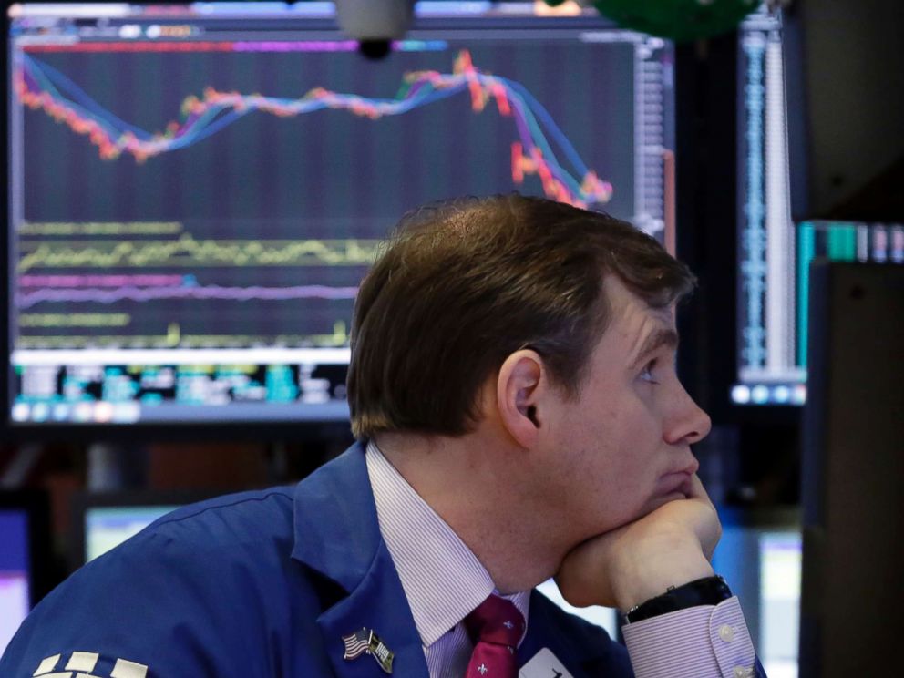 PHOTO: A specialist works on the floor of the New York Stock Exchange, March 22, 2018.