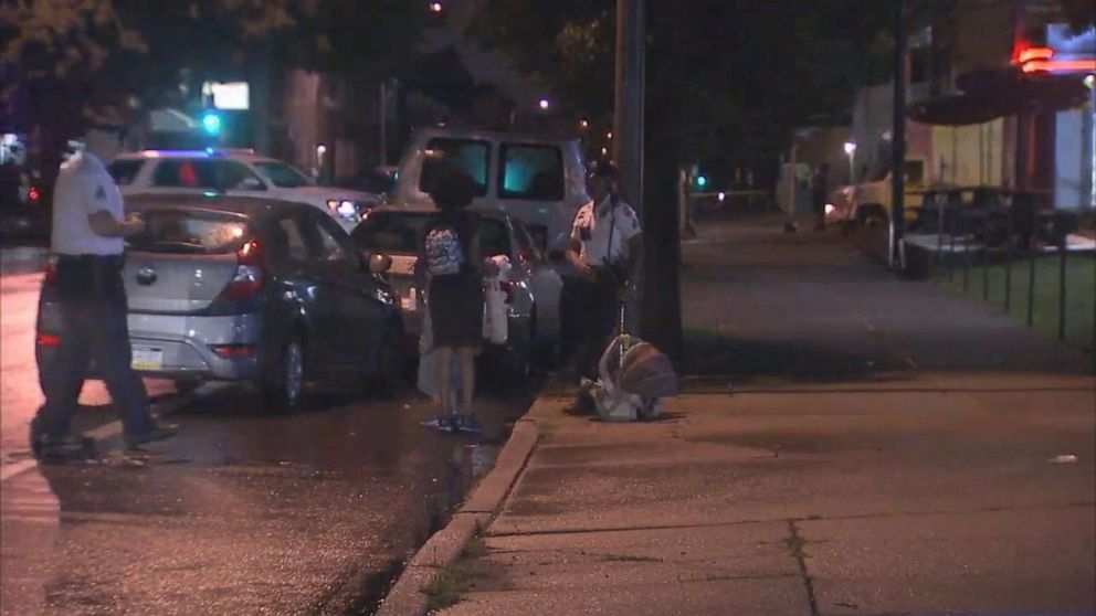 PHOTO: Police are shown with the stolen car while children were inside on July 11, 2019 in Philadelphia.
