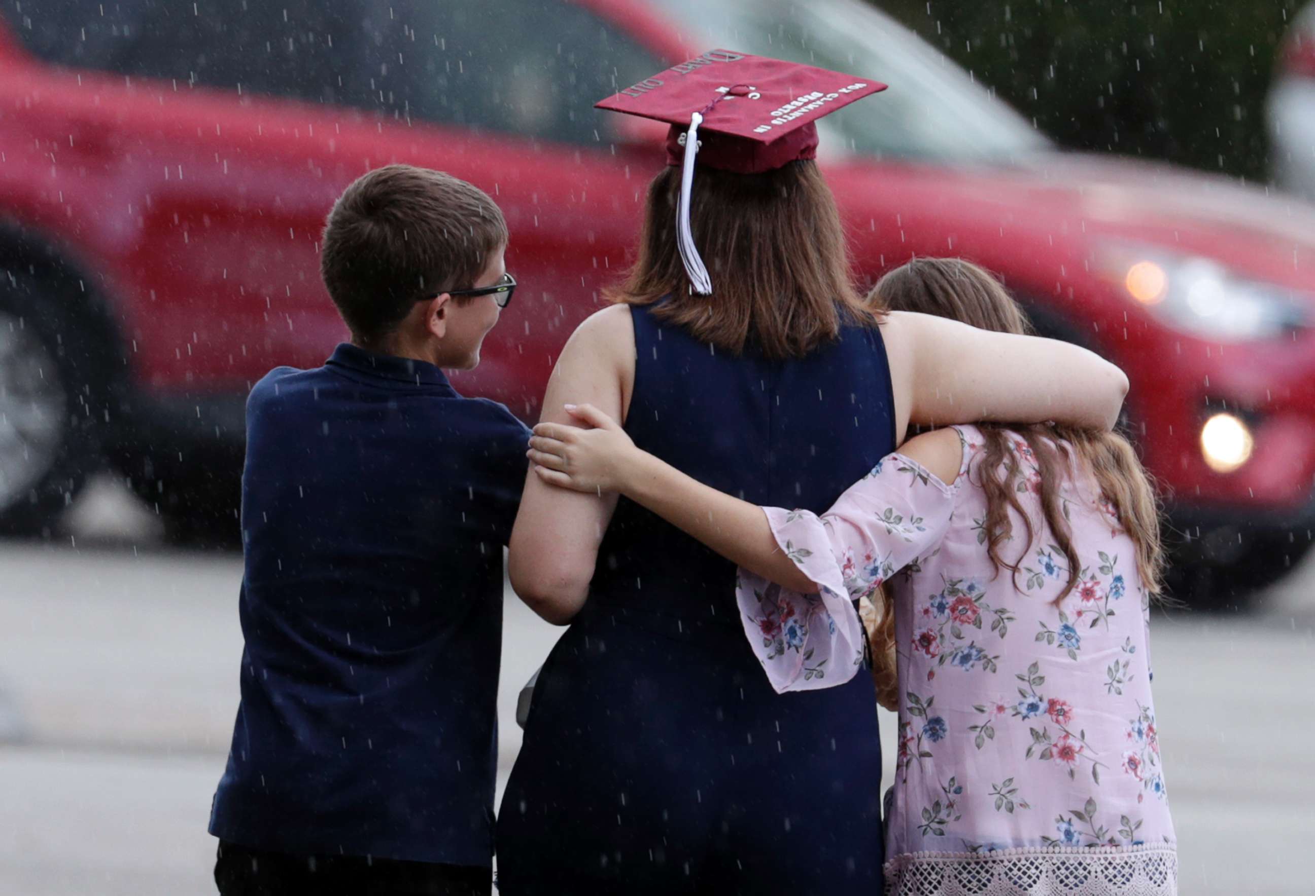 PHOTO: People leave a graduation ceremony for Marjory Stoneman Douglas seniors, June 3, 2018, in Sunrise, Fla.