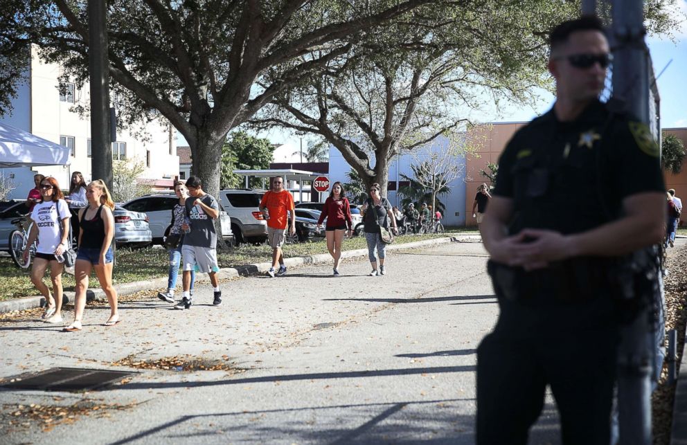 PHOTO: People visit Marjory Stoneman Douglas High School campus on Feb. 25, 2018 in Parkland, Fla. for the first time since the shooting that killed 17 people on Feb. 14.