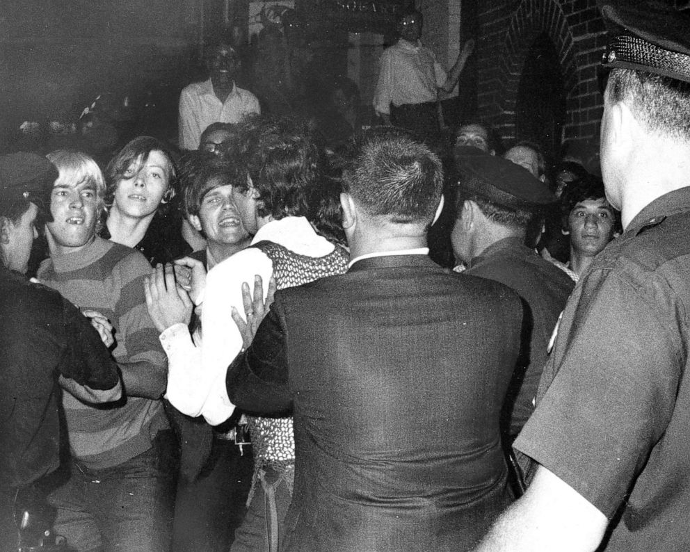 PHOTO: Crowd attempts to impede police arrests outside the Stonewall Inn on Christopher Street in Greenwich Village on June 28, 1969.