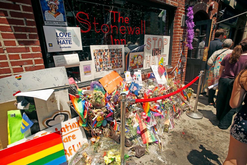 PHOTO: Flowers are laid outside the Stonewall Inn in memorial for Orlando Pulse shooting victims, June 27, 2016, in New York City.