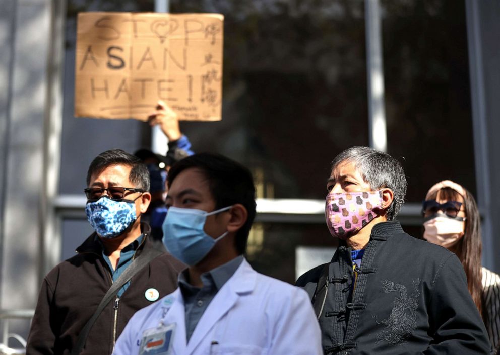 PHOTO: Protesters listen to speakers during a rally for justice for AAPI crime victims at the Thomas J. Cahill Hall of Justice on April 14, 2021 in San Francisco. 