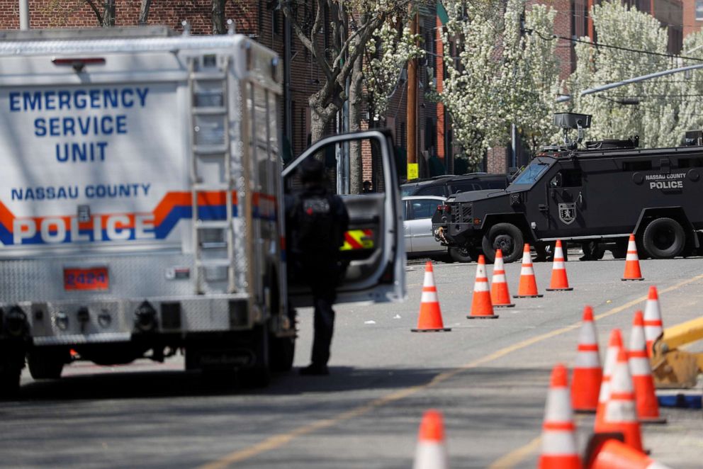 PHOTO: Law enforcement officers guard the place where the shooter allegedly barricaded himself, after a shooting at a Stop and Shop grocery store, in Hempstead, New York, April 20, 2021.