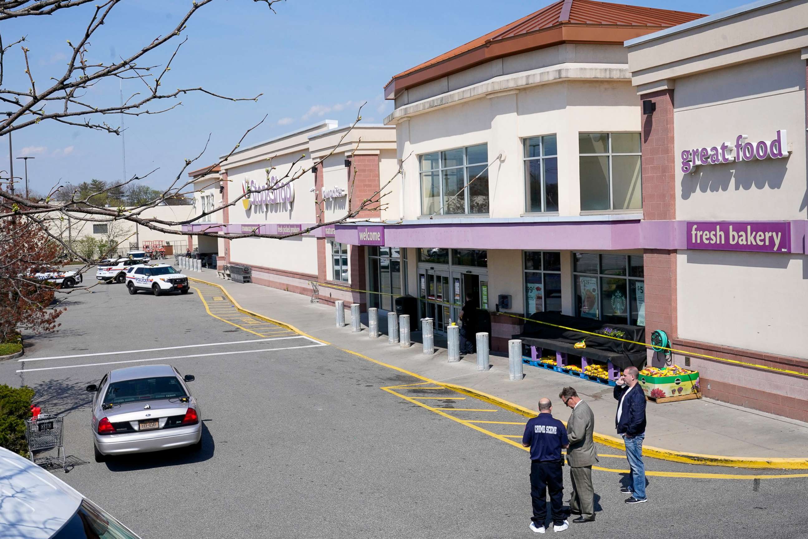 PHOTO: Emergency service personnel work at the scene of a shooting at a Stop & Shop supermarket, April 20, 2021, in West Hempstead, N.Y.