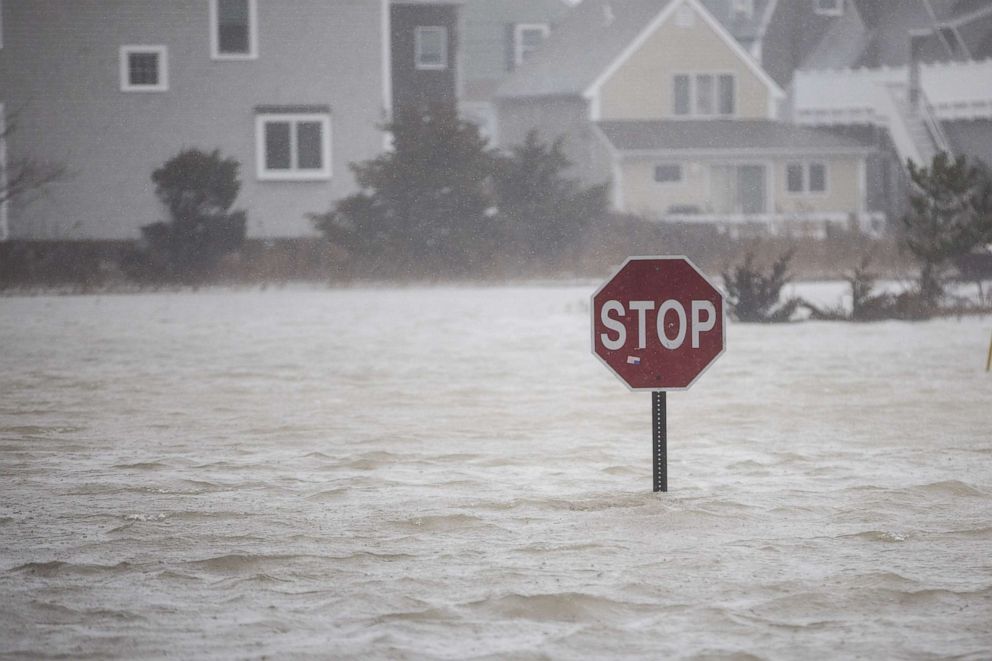 PHOTO: A flooded out road is pictured as a large coastal storm bears down on the region, March 2, 2018, in Scituate, Mass.