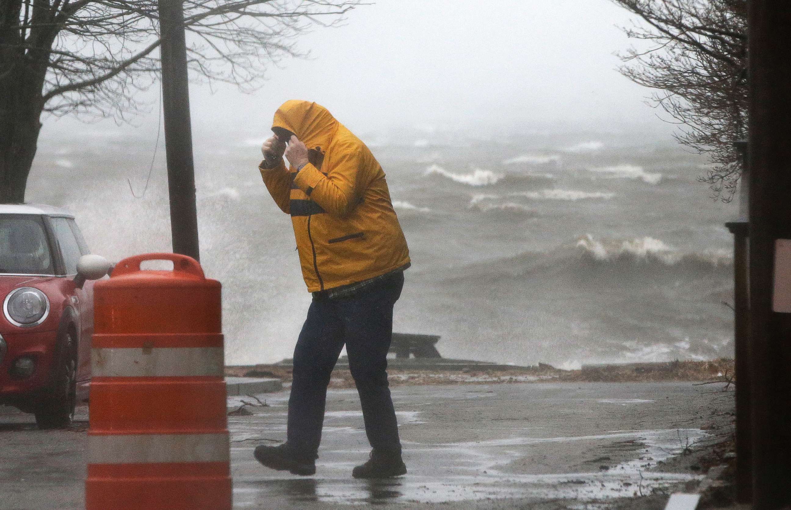 PHOTO: A pedestrian walks near the coastline, March 2, 2018, in Newburyport, Mass.