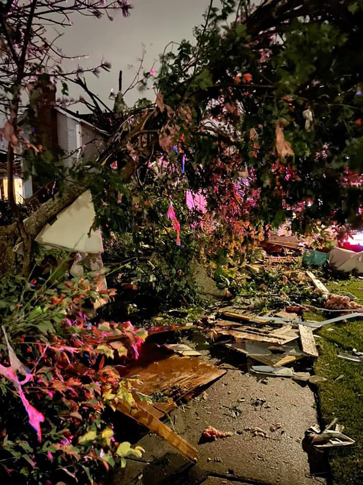 PHOTO: Debris is scattered after storm passed through Naperville, Illinois, June 21, 2021.