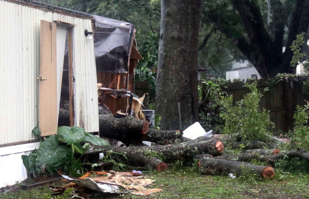 PHOTO: Pieces of an oak tree are seen after it fell on a mobile home in Pensacola, Fla., Sept. 5 2018.