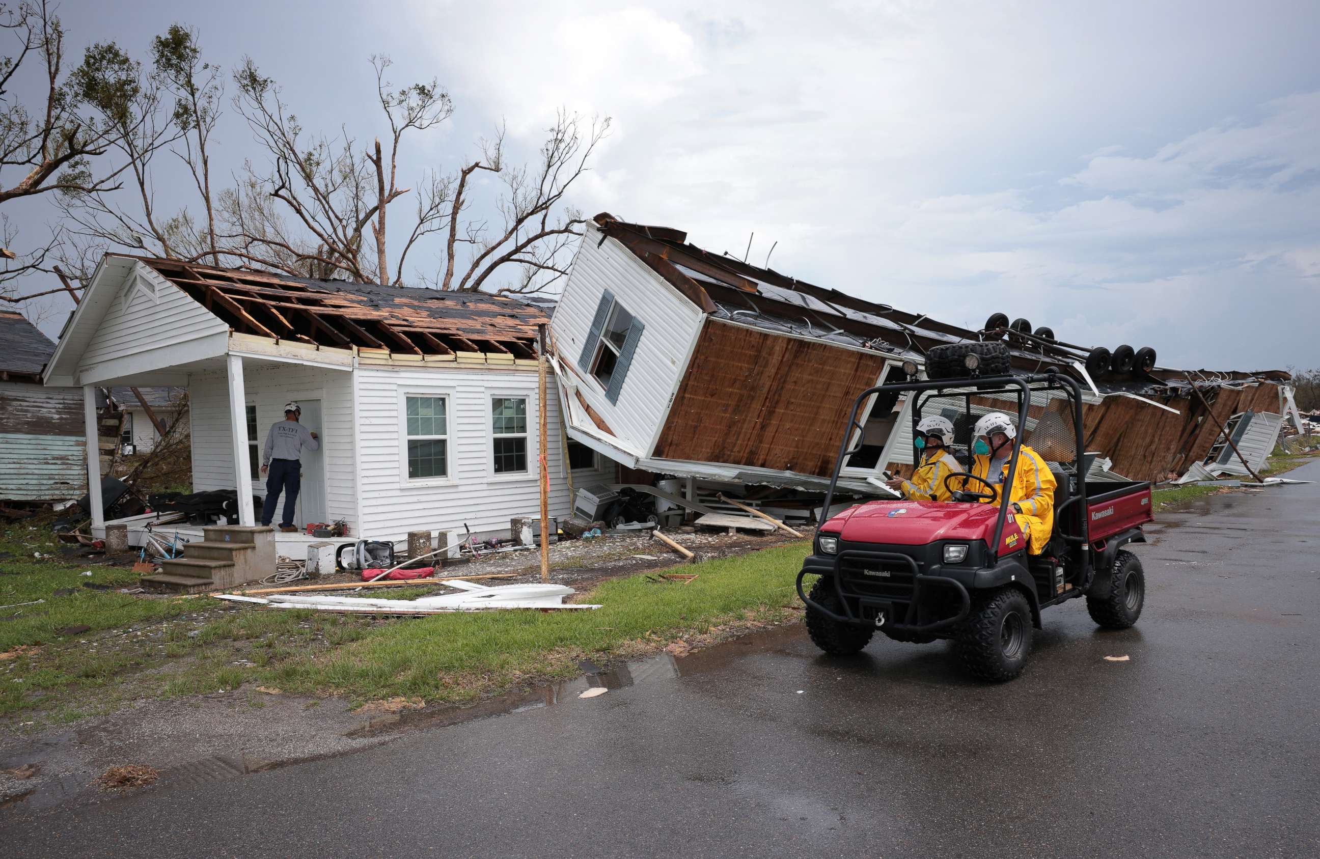 PHOTO: A search and rescue team from Texas works outside a home destroyed by Hurricane Ida, Sept. 1, 2021, in Golden Meadow, La.
