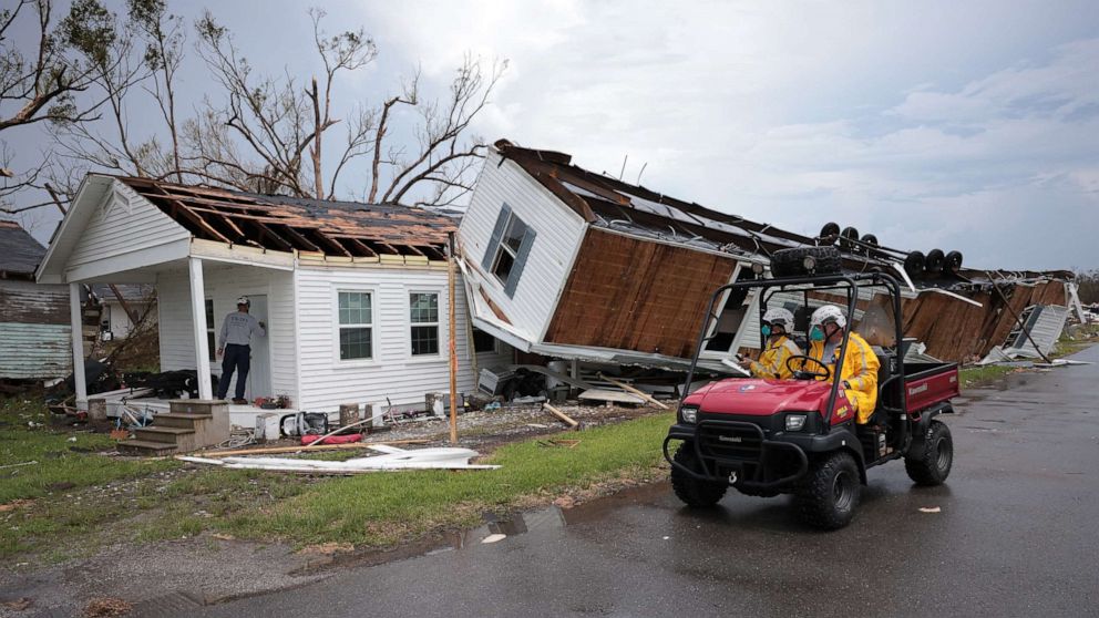 PHOTO: A search and rescue team from Texas works outside a home destroyed by Hurricane Ida, Sept. 1, 2021, in Golden Meadow, La.