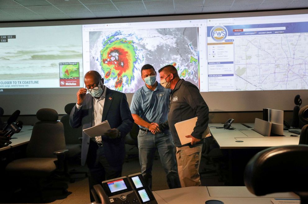 PHOTO: Houston Mayor Sylvester Turner, left, studies his notes before a press conference, Sept. 13, 2021, at the city's emergency operations center in Houston as Hurricane Nicholas strengthened just off the Gulf Coast of Texas.