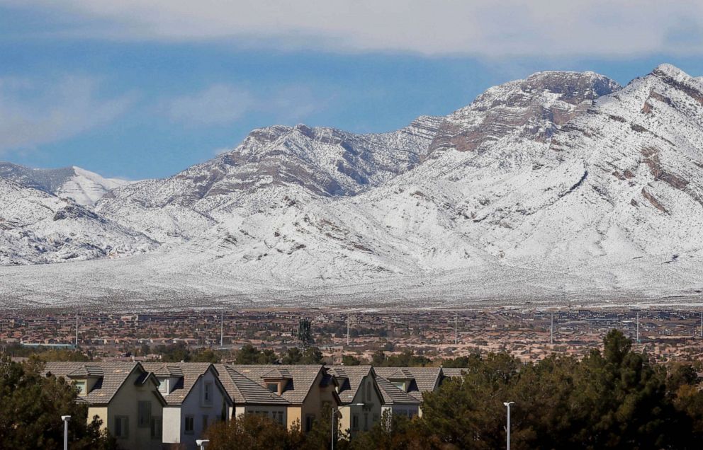 PHOTO: Homes are shown on the northwest side of town, near a snowy landscape in Clark County, Las Vegas, March 1, 2023.