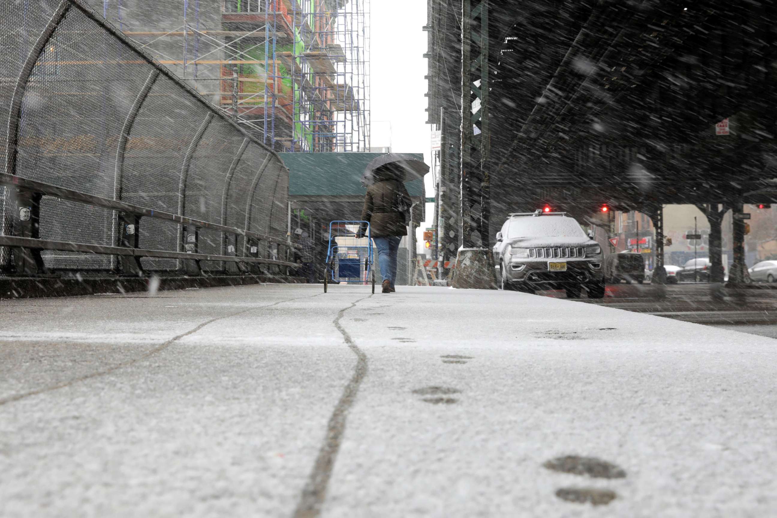 PHOTO: A pedestrian walks through a late season snow storm in New York City, March 21, 2018.