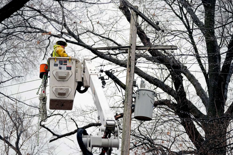PHOTO: A DTE contractor crew works on a power line, Feb. 27, 2023, in northwest Detroit.