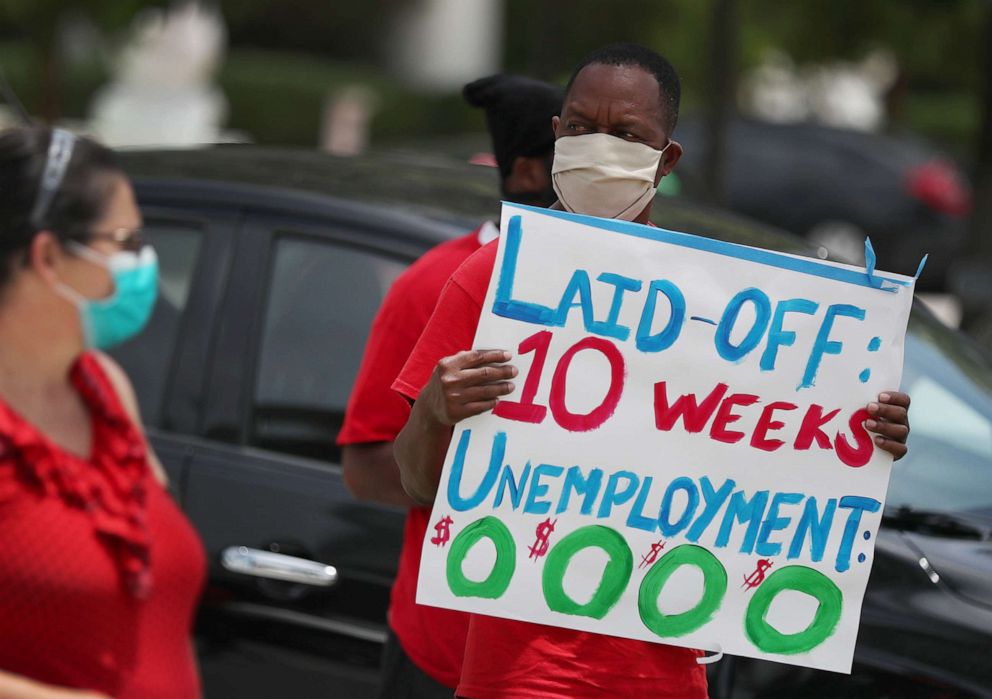 PHOTO: Joseph Louis joins others in a protest asking the state of Florida to fix its unemployment system, May 22, 2020, in Miami Beach, Fla. 