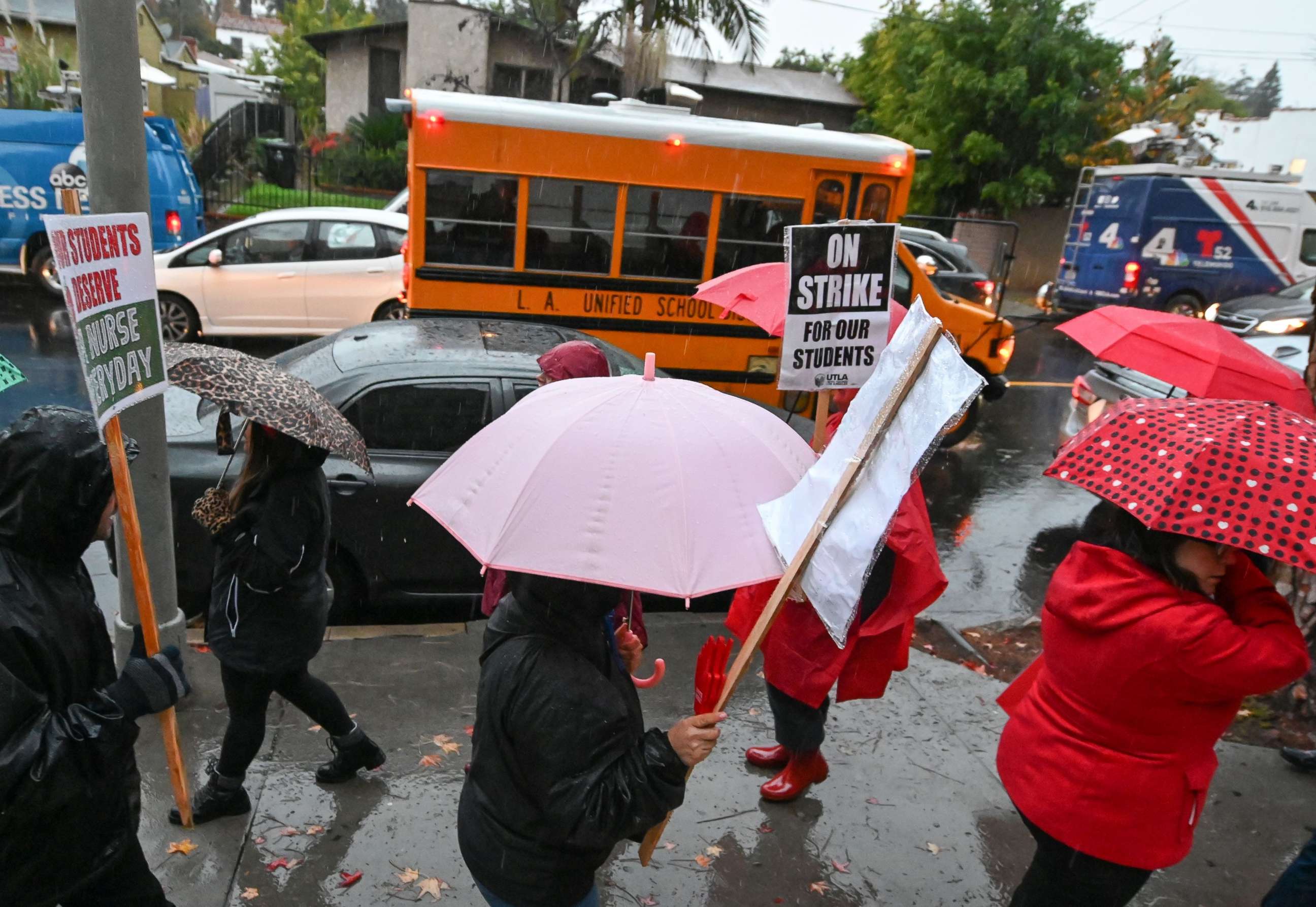 PHOTO: A school bus arrives with students as teachers and their supporters picket outside John Marshall High School in Los Angeles, on the first day of the teachers' strike, Jan. 14, 2019. 