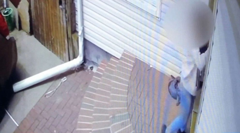 PHOTO: This image made from video shows a 13-year-old girl banging on a door following a struggle with a man.