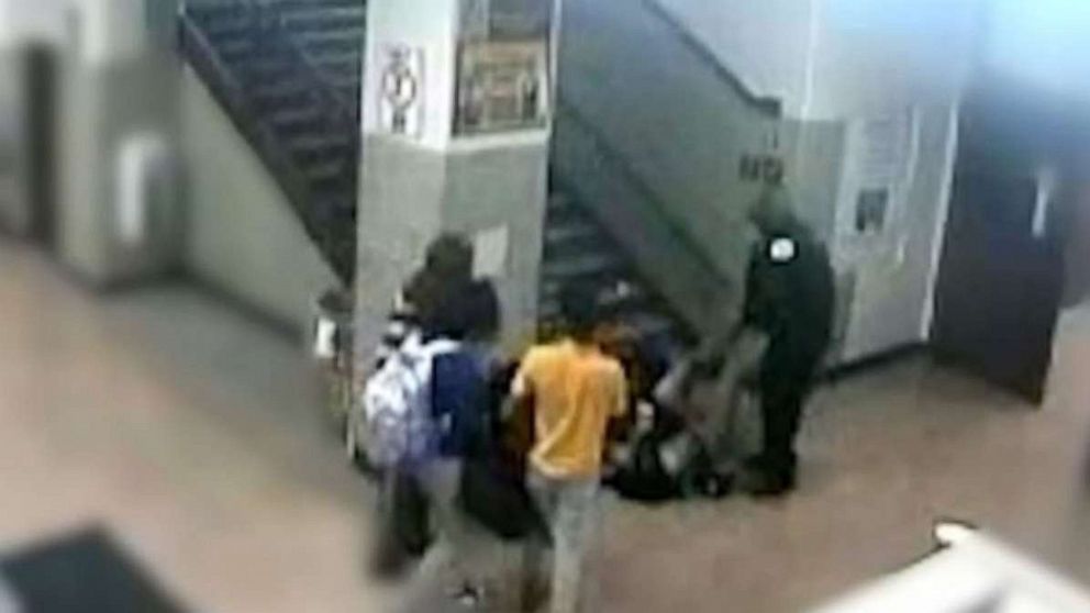 PHOTO: A school resource officer at John Marshall Metropolitan High School in Chicago can be seen dragging a 16-year-old girl down a flight of stairs in a February incident.