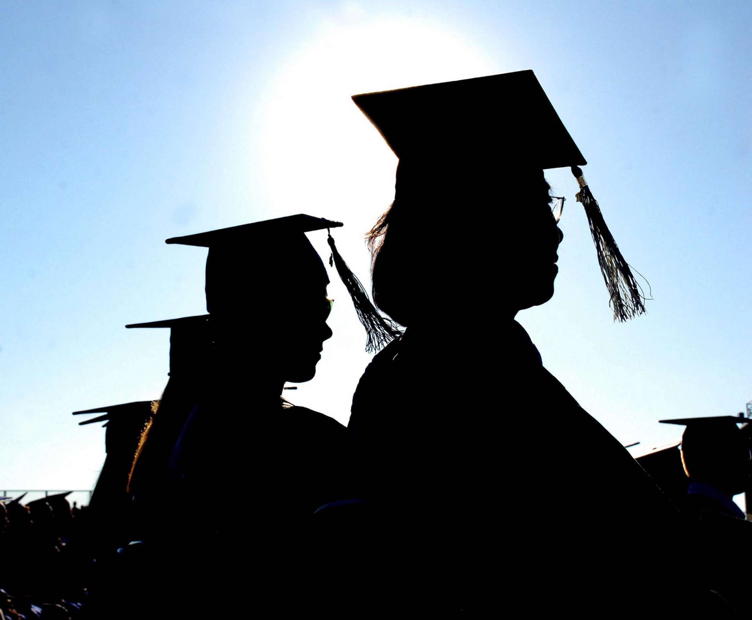 PHOTO: Graduates line up during commencement ceremony in Mansfield, N.J., June 18, 2010.