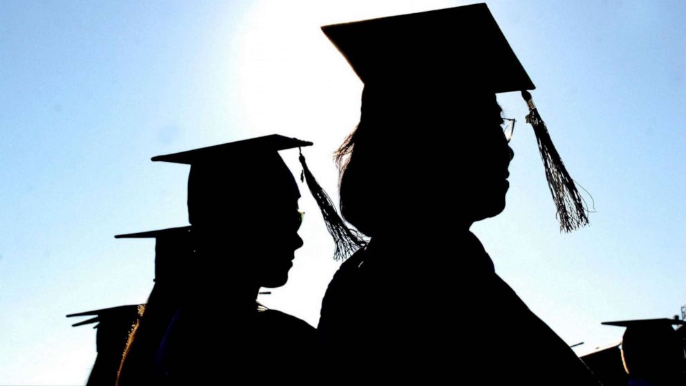 PHOTO: Graduates line up during commencement ceremony in Mansfield, N.J., June 18, 2010.